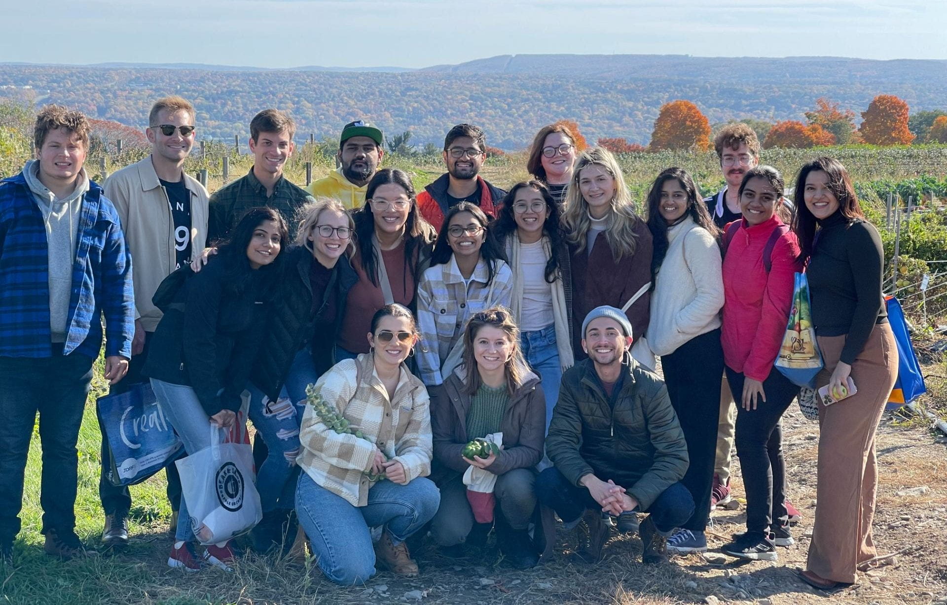 Group of MPH students at an apple picking event